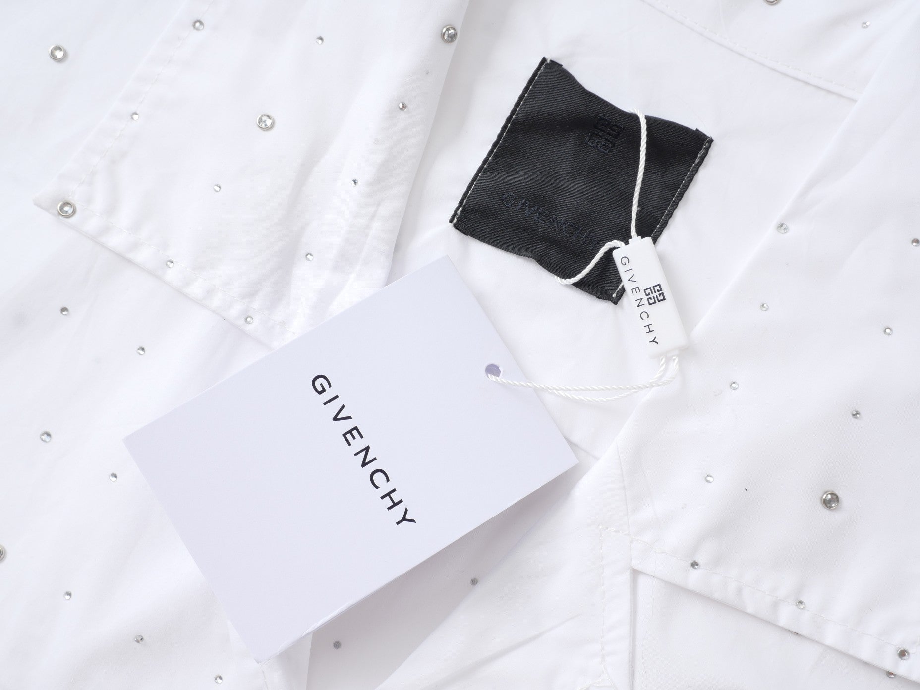G's T-shirts with metal diamonds all over them